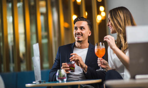 Couple enjoying drinks in Bath Couple enjoying cocktails at Apex City of Bath Hotel