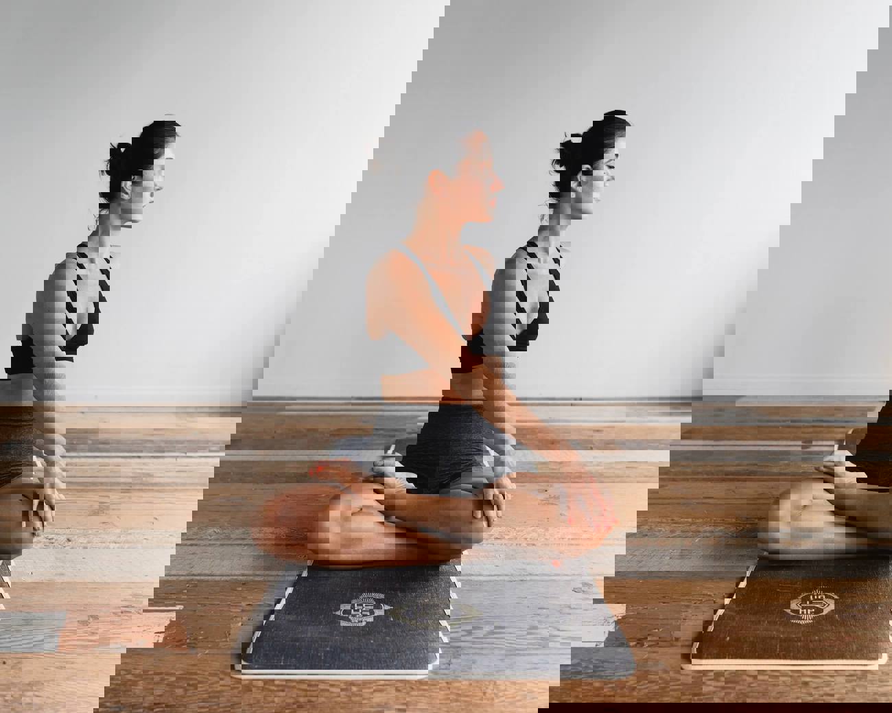 Lady doing Yoga at home