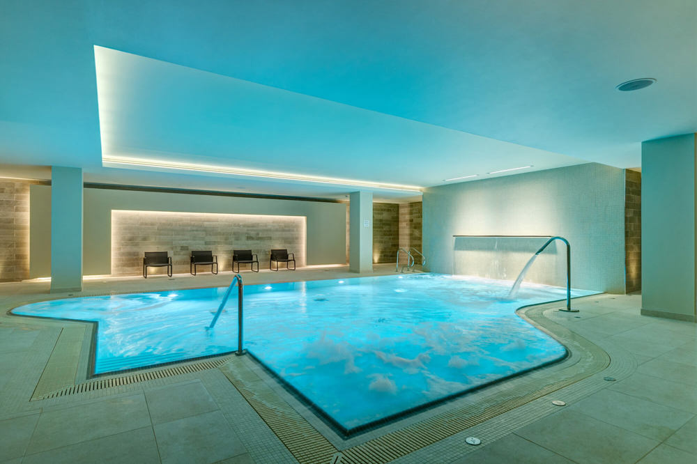 Indoor swimming pool at Apex City of Bath Hotel