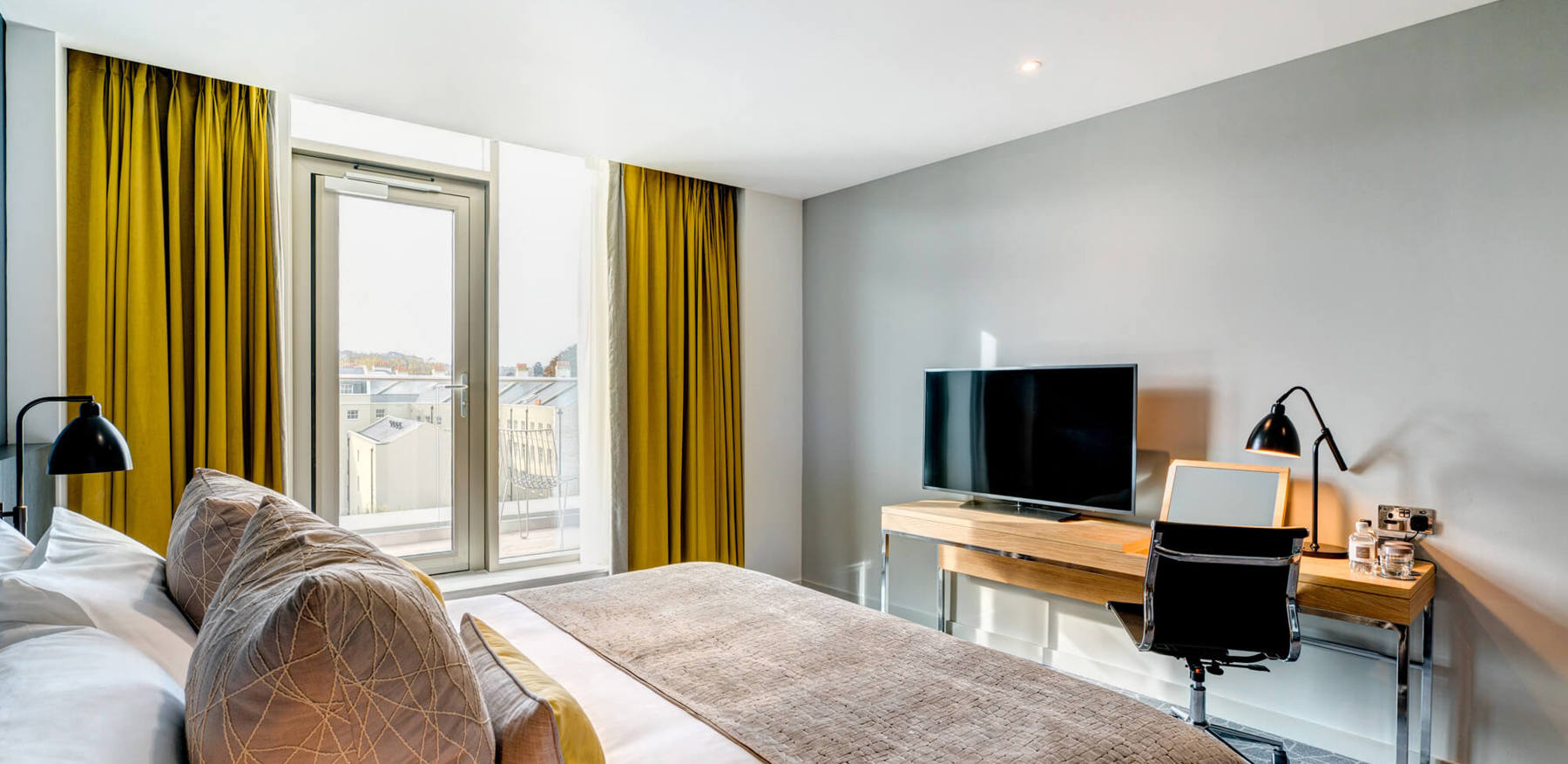 City Room with king-size bed and desk with TV