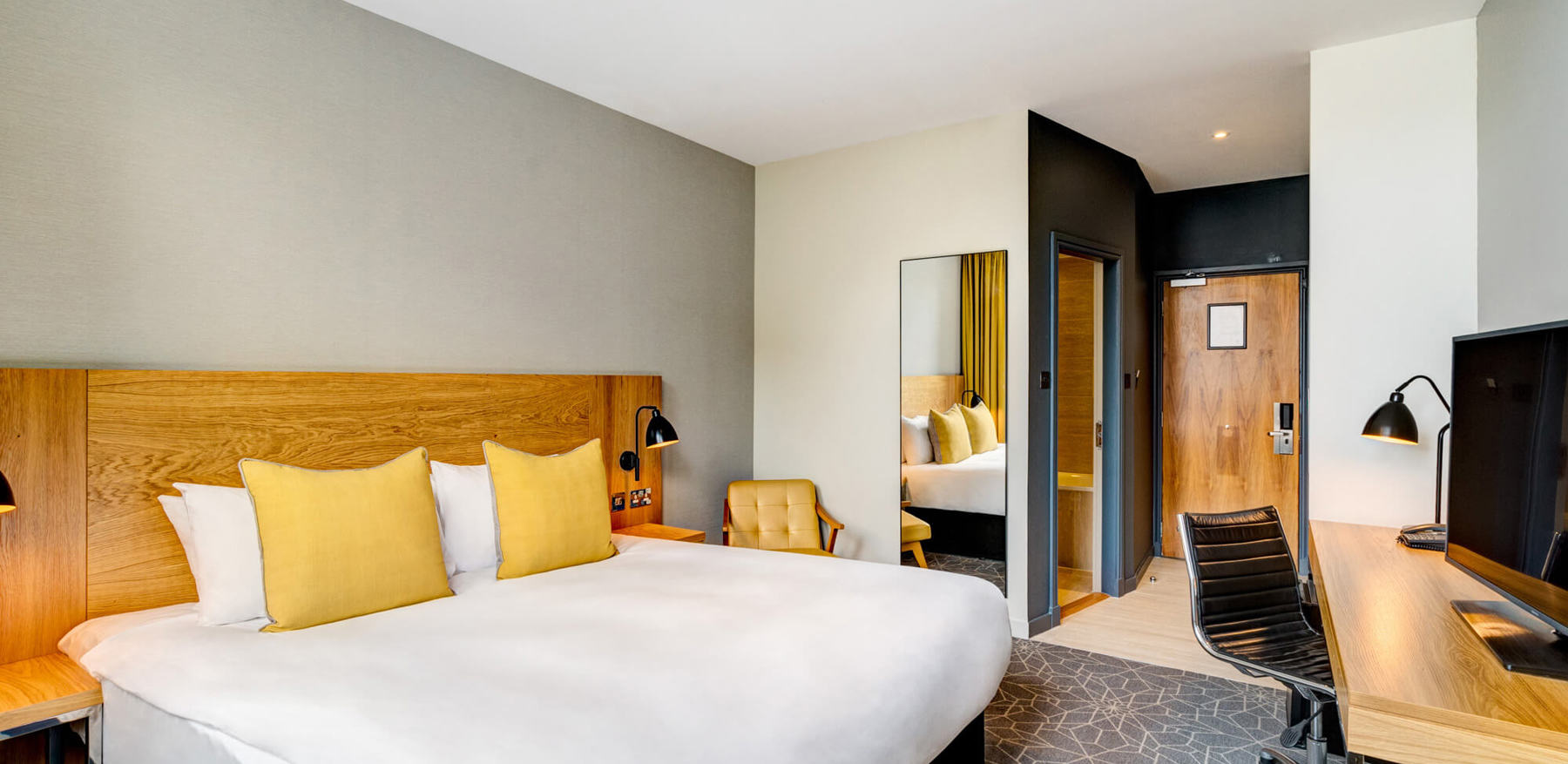 City Room with queen-size bed and desk at Apex Grassmarket Hotel