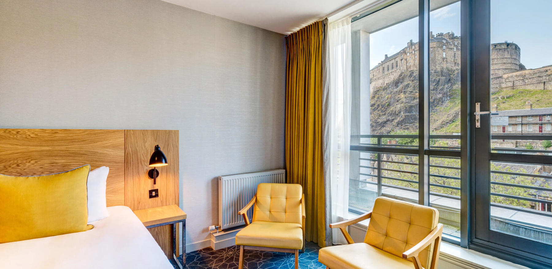 Castle View Deluxe Room with Balcony view of Edinburgh Castle at Apex Grassmarket Hotel
