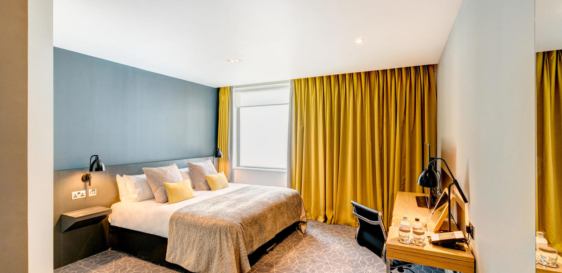 City Room with king-size bed and desk with TV