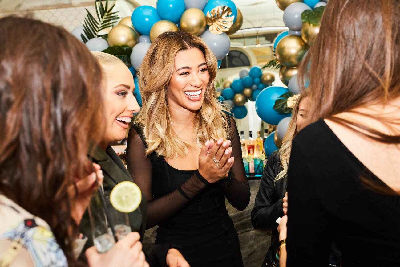 Montana Brown Swim Society launch party with guests