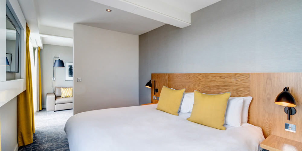 Junior Suite bedroom at Apex City Quay Hotel