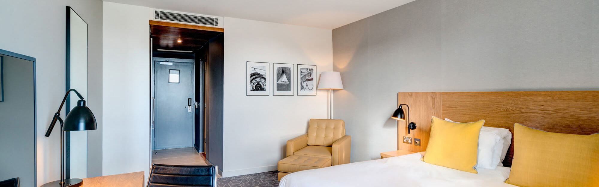 King-size bed with desk and TV