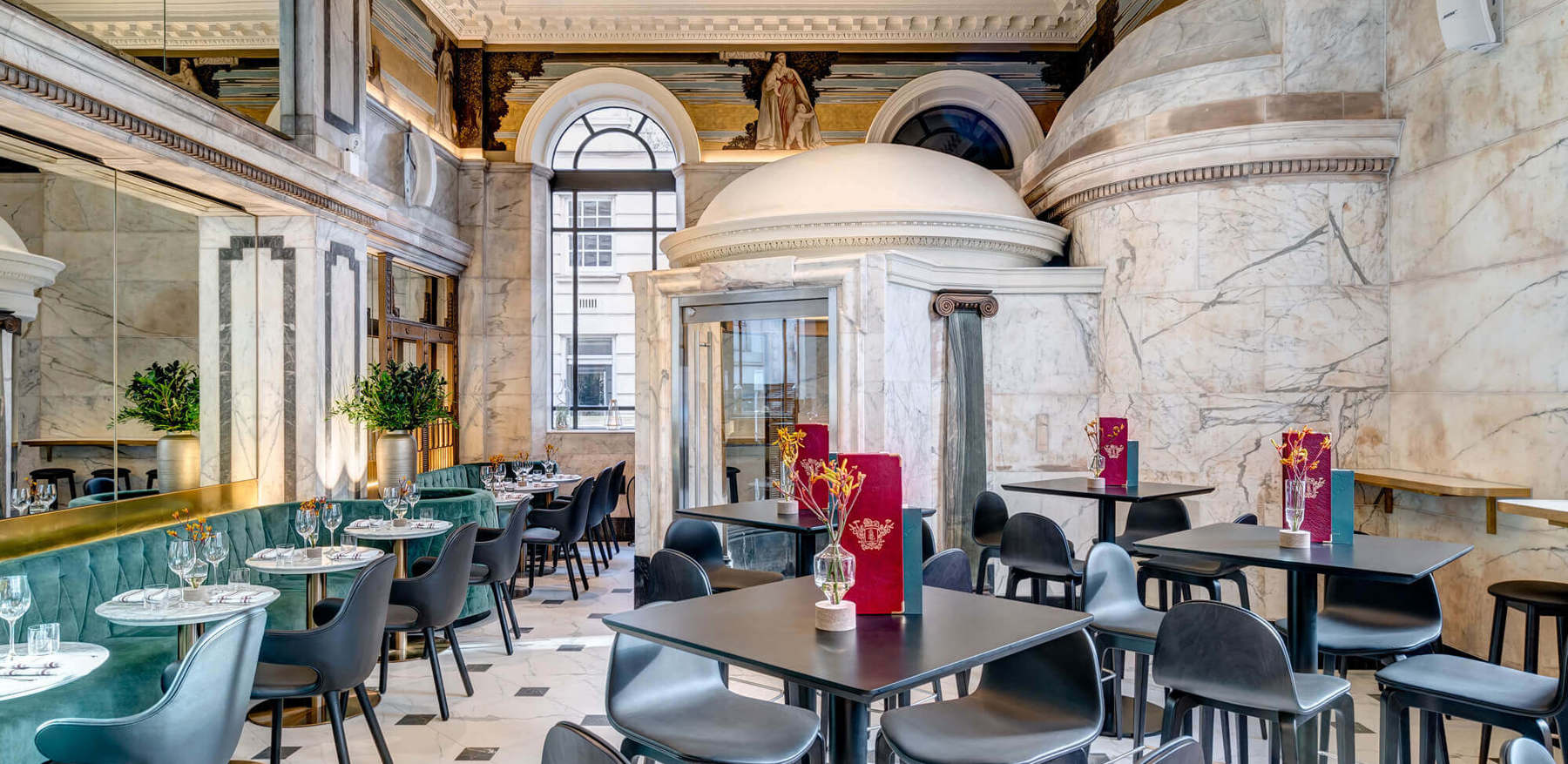 Empty Restaurant With Tables, Blue Velvet Seating & Marble Interior